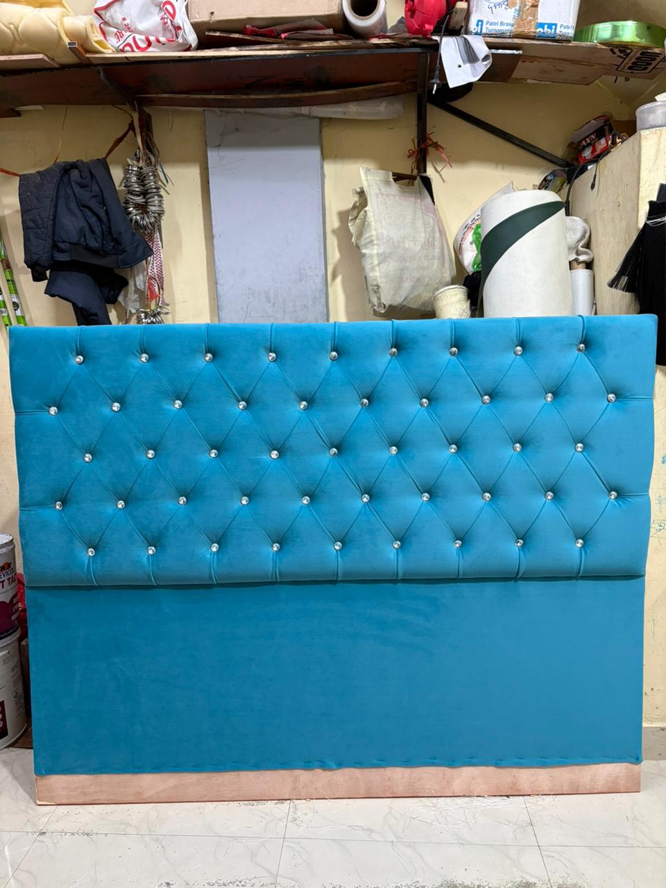 Blue tufted headboard